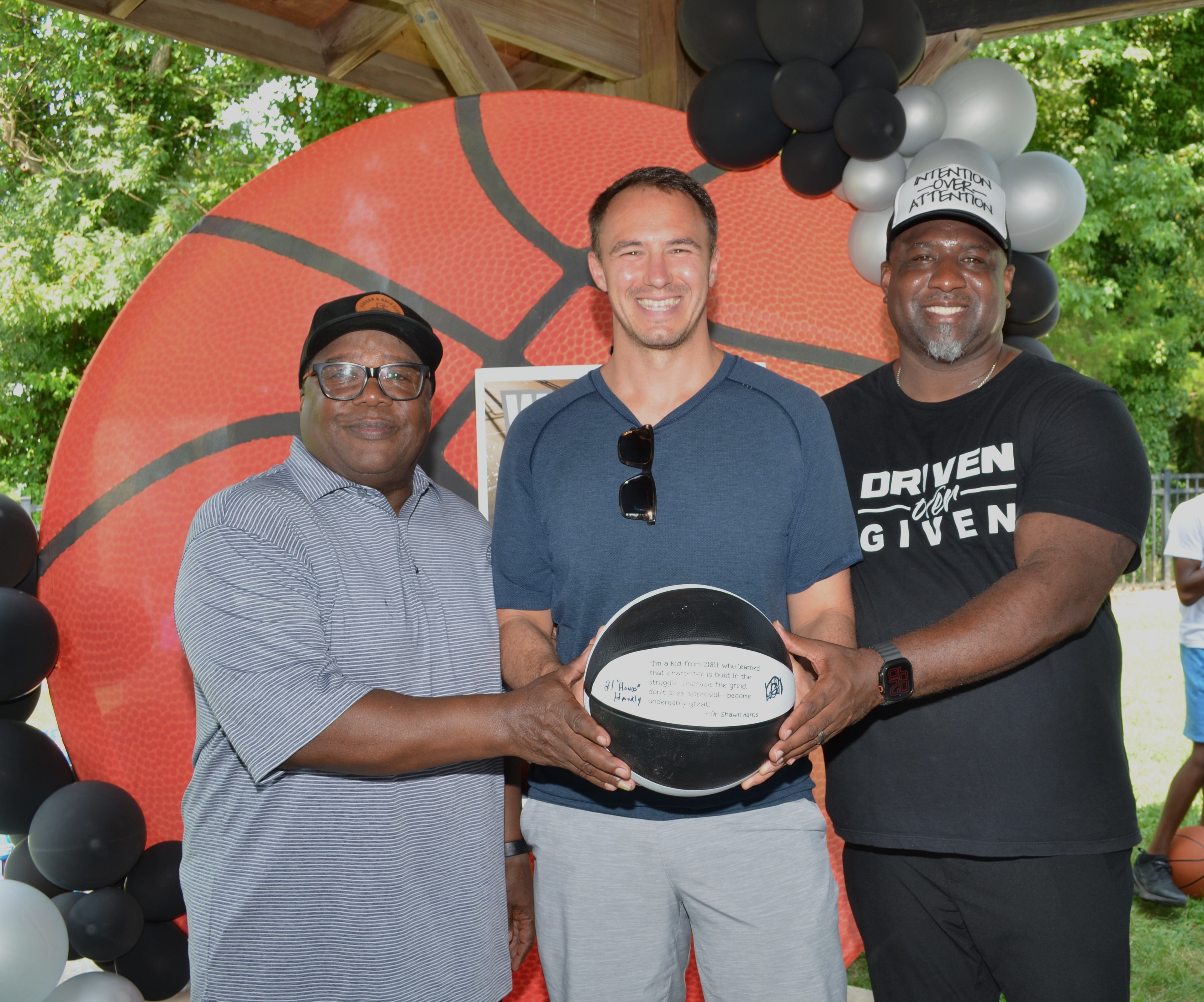 Boys and men at a Driven Over Given Inc. Young Kings community event